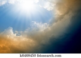 Bright sun and dark clouds Bright sun and dark clouds