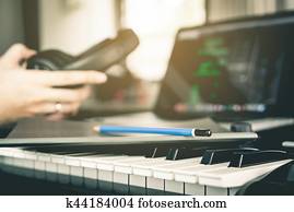 Musician prepare to writing his new song in studio