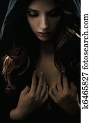 Portrait of a young woman in hood