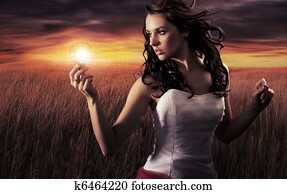 Woman holding a light bulb Woman holding a light bulb