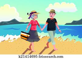 Senior couple walking on the beach Senior couple walking on the beach