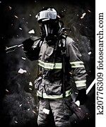 A firefighter Poses after a long fi A firefighter Poses after a long fi