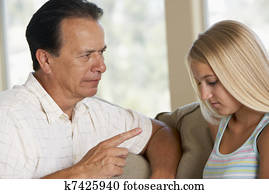 Man Having A Serious Talk With His Daughter