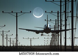 Plane landing in airport at night Plane landing in airport at night