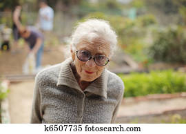 Portrait of a senior woman outdoors, looking in camera Portrait of a senior woman outdoors, looking in camera