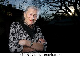 Portrait of a senior woman outdoors, smiling Portrait of a senior woman outdoors, smiling