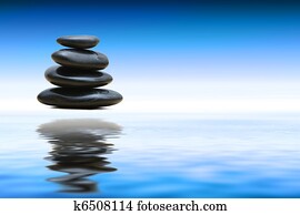 Zen stones over water