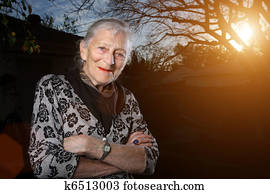 Portrait of a senior woman outdoors, smiling Portrait of a senior woman outdoors, smiling