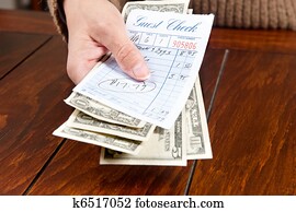 Woman paying bill