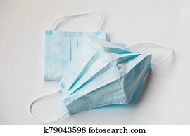 Virus protection mask against pandemic of coronavirus COVID-19 isolated on white Virus protection mask against pandemic of coronavirus COVID-19 isolated on white