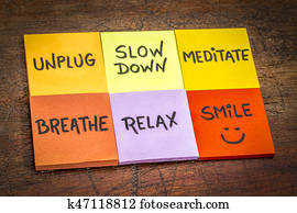 unplug, slow down, meditate, breathe, relax, smile concept unplug, slow down, meditate, breathe, relax, smile concept