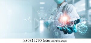 Healthcare and medicine, Covid-19, Doctor holding and diagnose virtual Human Lungs with coronavirus spread inside on modern interface screen on hospital background, Innovation and Medical technology. Healthcare and medicine, Covid-19, Doctor holding and diagnose virtual Human Lungs with coronavirus spread inside on modern interface screen on hospital background, Innovation and Medical technology.