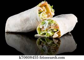 CHICKEN SALAD WRAP with reflection isolated on black background