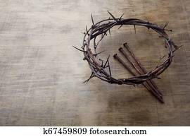 Jesus Crown Thorns and nails on Old and Grunge Wood Background. Vintage Retro Style. Free space for text