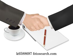 Handshake over paper and pen.