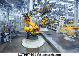 robôs, um carro, planta