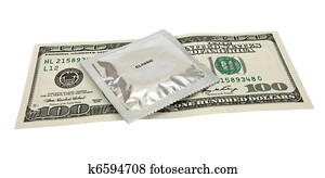 Condom with money on white