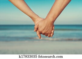 amantes, pareja que sujeta manos