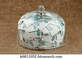 Money and bell glass