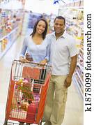 Couple grocery shopping