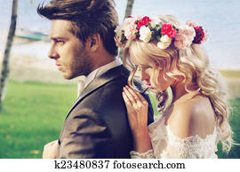 Tough groom with his delicate wife