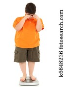 Morbidly Obese Fat Child on Scale Morbidly Obese Fat Child on Scale