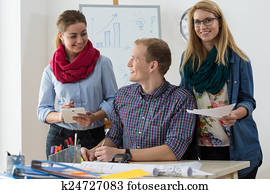 Friends working together at office