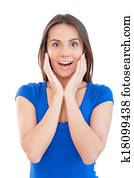 What the great news! Beautiful young smiling woman looking at camera and gesturing while standing isolated on white