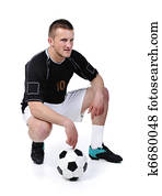 Football player is holding ball isolated on white