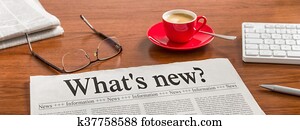 A newspaper on a wooden desk - Whats new A newspaper on a wooden desk - Whats new