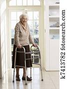 Elderly Senior Woman Using Walking Frame