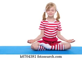girl with eyes closed practicing yoga