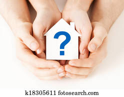 hands holding house with question mark hands holding house with question mark