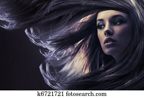 Beautiful lady with long brown hair, at moonlight