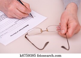 elderly woman writing testament elderly woman writing testament