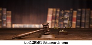 Law and justice concept, Brown wooden background Law and justice concept, Brown wooden background