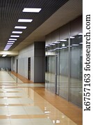 Wall with glass partitions and doors in office building