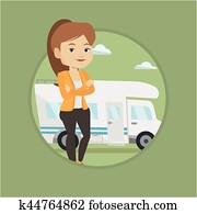Woman standing in front of motor home.