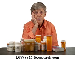 Elderly woman with medications Elderly woman with medications