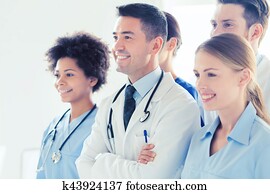 group of happy doctors at hospital group of happy doctors at hospital