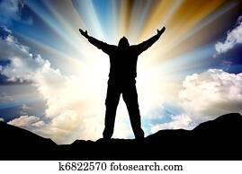 Silhouette of man and sunshine