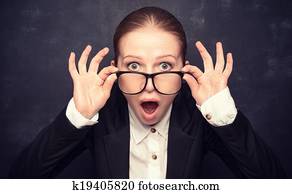 Surprised funny teacher in glasses shouts Surprised funny teacher in glasses shouts
