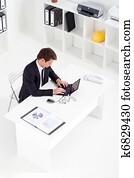 young businessman working in office