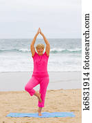 senior woman doing yoga exercise