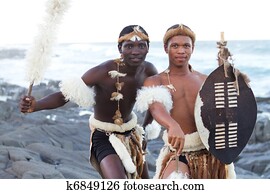 african zulu man on beach