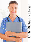 Cute nurse looking at the camera