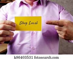 Financial concept meaning Shop Local H with sign on the sheet. Financial concept meaning Shop Local H with sign on the sheet.