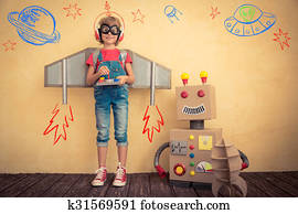 feliz, criança, tocando, com, robô brinquedo