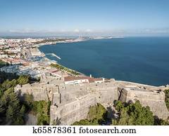 Aerial view of Setubal with fortress in the forest, Portugal