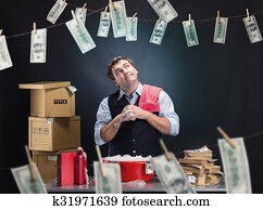 Glad businessman is laundering money